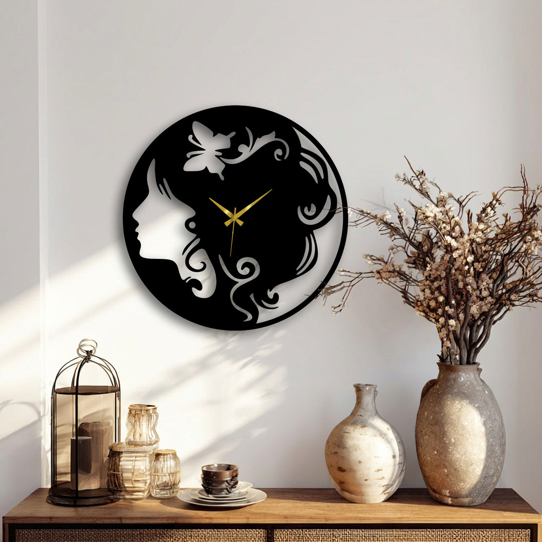 Smooth transitions from light to shadow emphasize the elegant black metal woman silhouette decorative metal art clock.