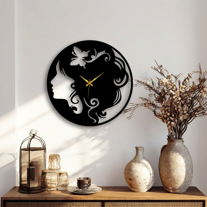 Smooth transitions from light to shadow emphasize the elegant black metal woman silhouette decorative metal art clock.