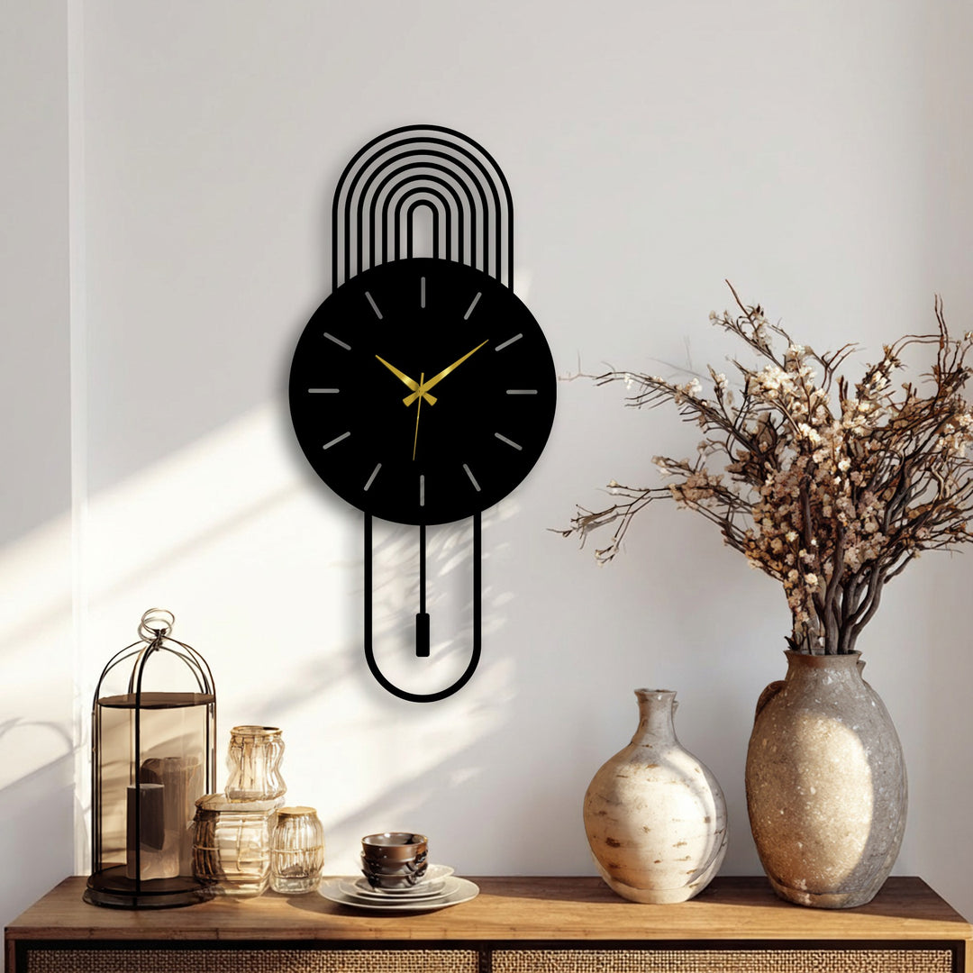 Featuring a modern arc metal wall clock with a minimal pendulum design, this decorative metal art offers a stylish timepiece for contemporary interiors.