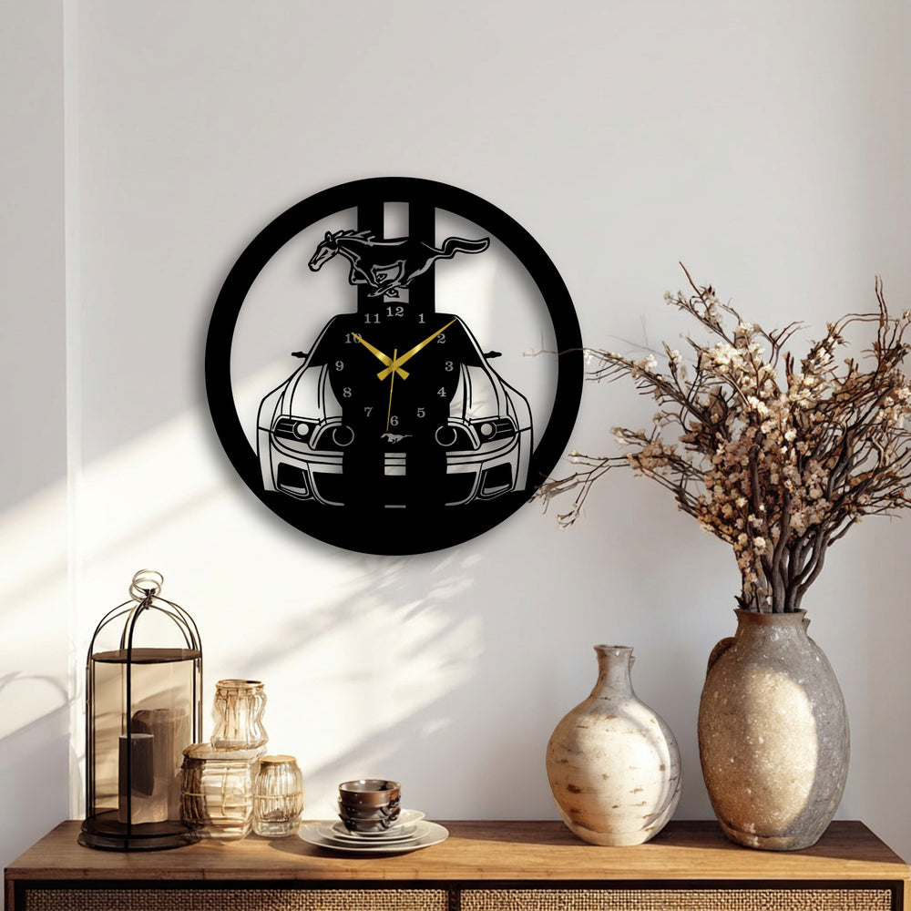 Textured decorative metal art forms the wild mustang muscle car clock's surface, highlighting the contrasting matte and polished details.