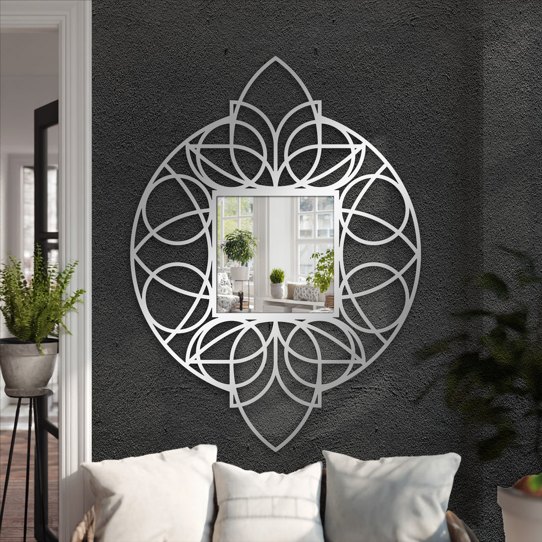 A calming mood radiates from the geometric floral mandala mirror for wall decor, casting a subtle glow against the textured wall.