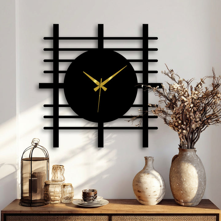 Black finish accentuates the modern grid panel metal art for wall clock, a minimalist decorative piece with striking gold hands.