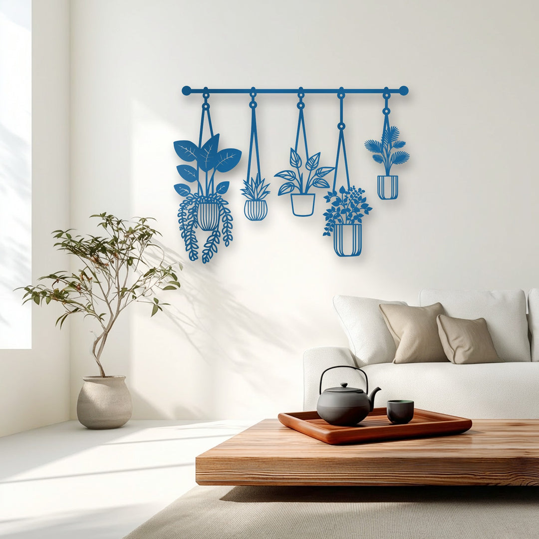 The geometric elements of the deep blue hanging plants metal artwork showcase modern botanical decor.