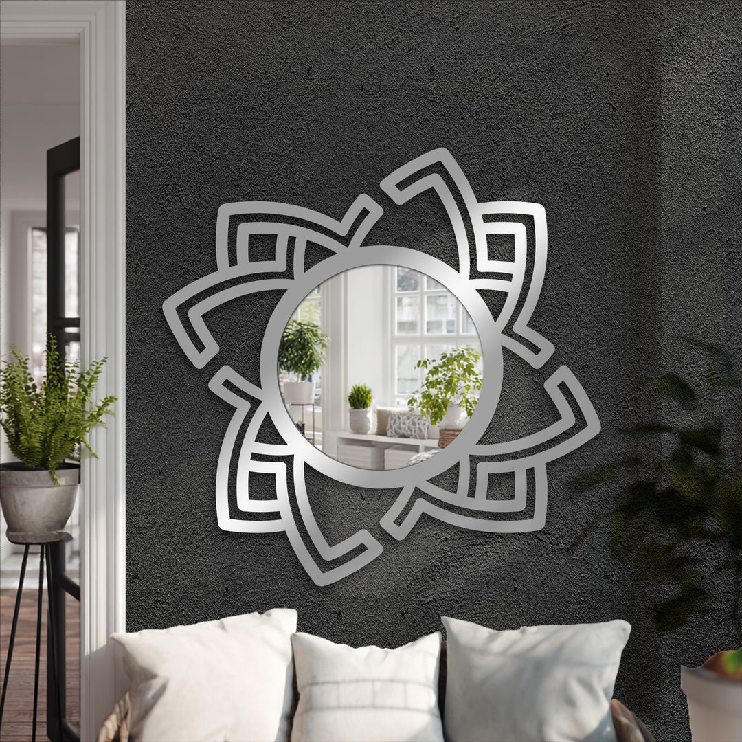 Silver finish of the abstract rotating frame showcases a modern wall mirrors design, reflecting light and adding depth to the dynamic wall art.