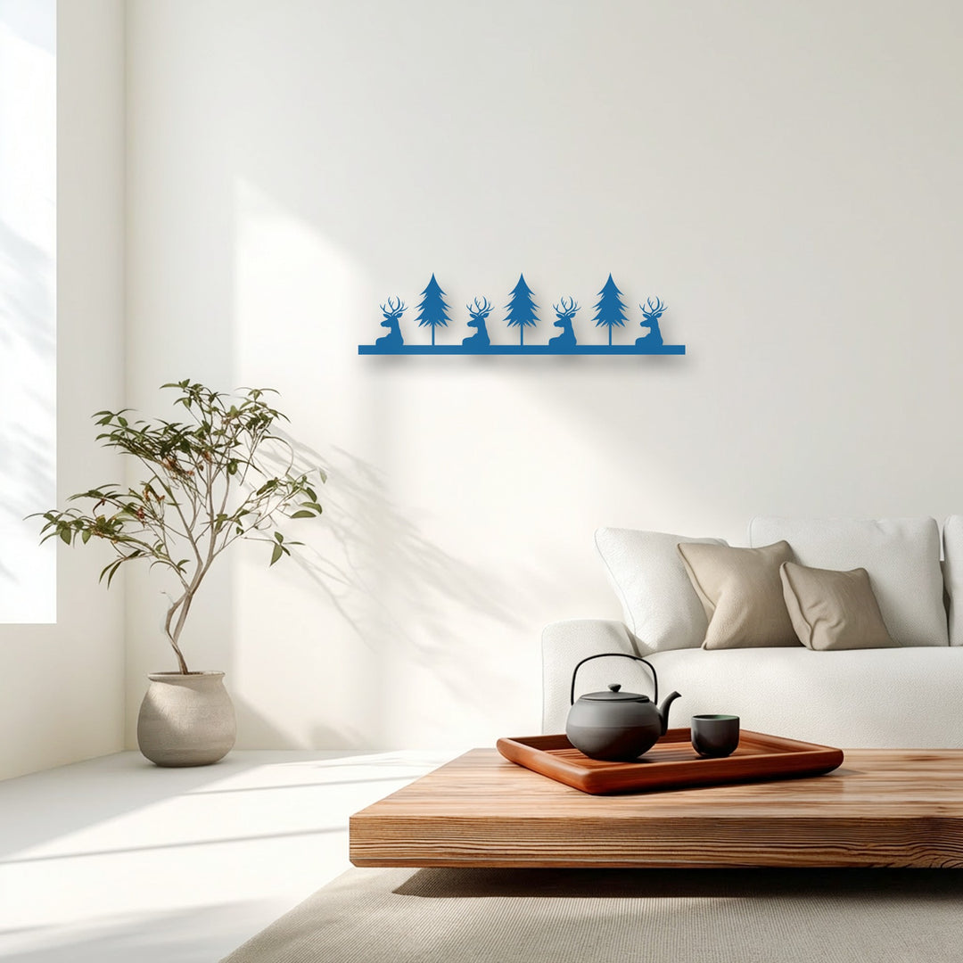 Featuring a smooth matte blue finish, this rustic deer and pine forest silhouette metal wall decor adds a charming touch.