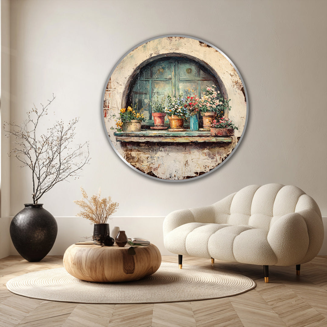 The stillness of the round oil painting art piece captures a rustic window scene, complete with colorful flower pots basking in the gentle light.