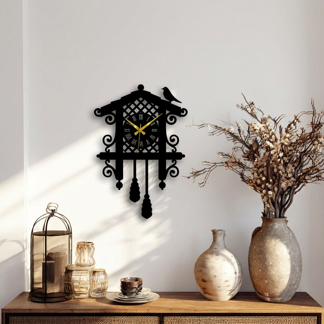 Shadows emphasize the silhouette of a classic cuckoo metal artwork clock featuring a vintage bird design against a neutral wall, casting a stark contrast.