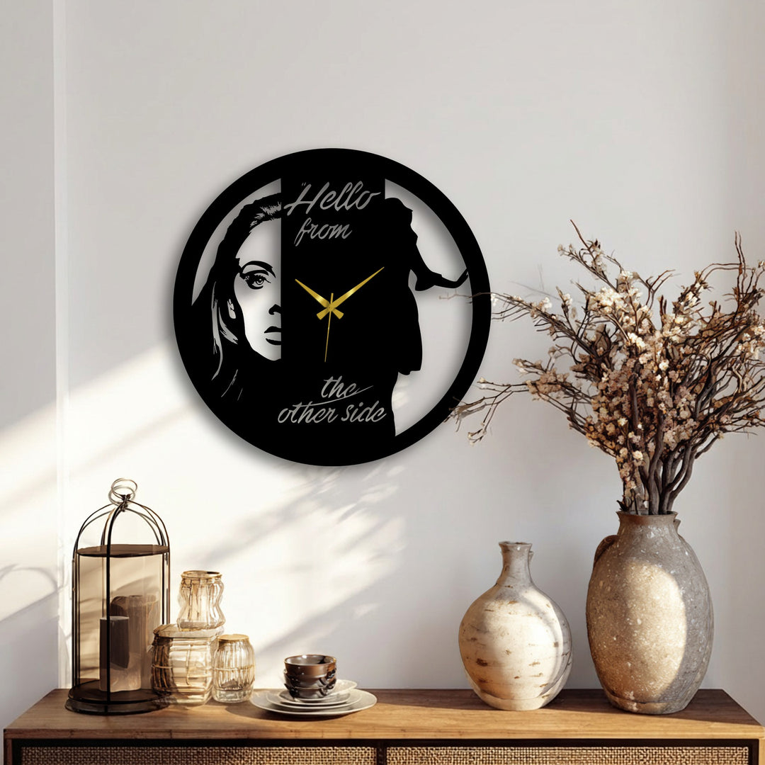 Soft light and shadow highlight the dual face metal wall clock, showcasing its artistic portrait design as a unique piece of decorative metal art.