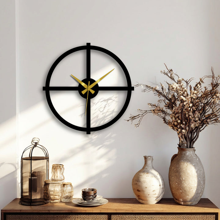 Sharp color contrast defines this minimalist black cross metal art for wall clock, with golden hands against the white background, creating a modern decorative piece.