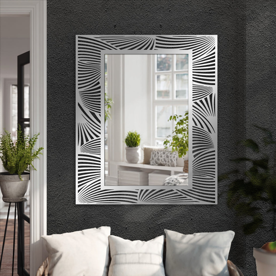 Evoking natural movement, the abstract wave patterns of this framed mirror accentuate the fluidity of organic forms in a modern wall mirrors.