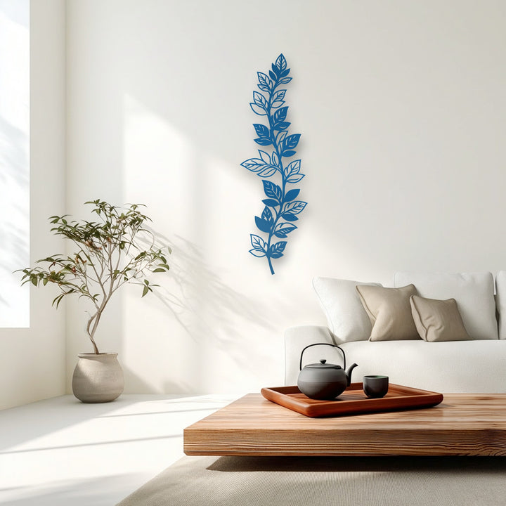 Vertical botanical leaf branch metal art for wall featuring an elongated, organic foliage shape.