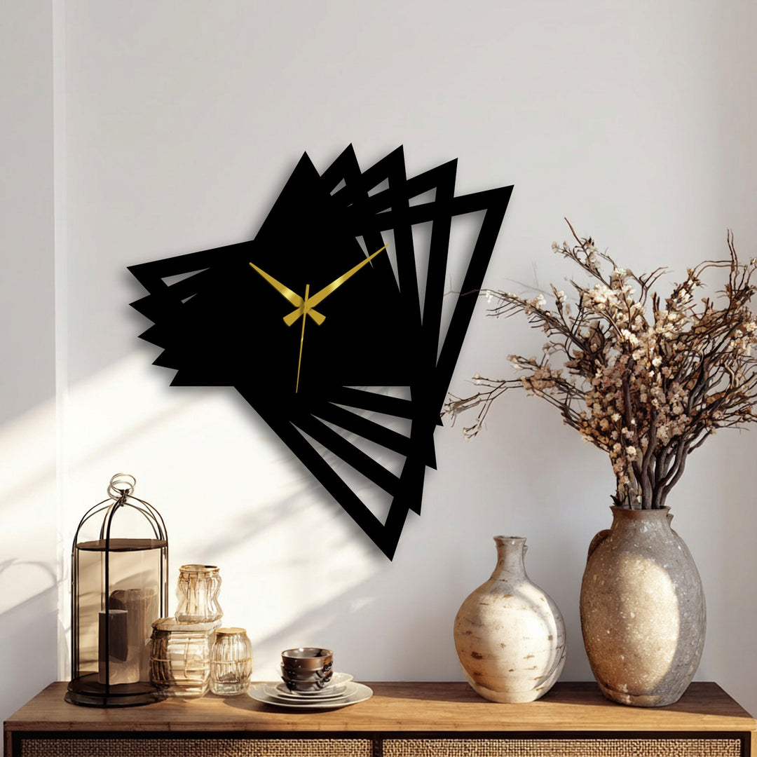 Highlighting the focal point, the gold hands stand out on this abstract origami geometric modern metal wall clock, a piece of unique metal wall art.