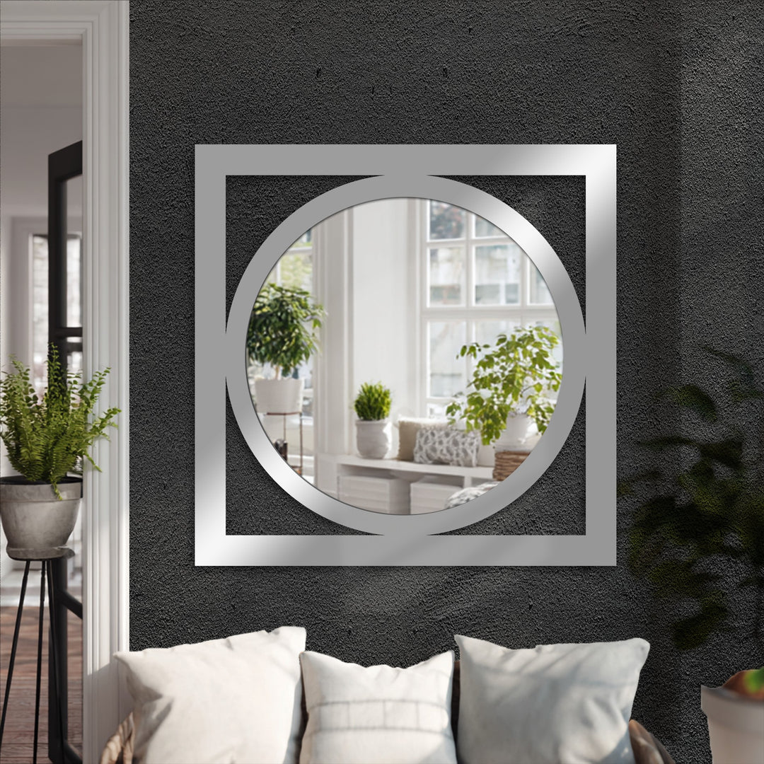 An inviting mood is created by the circle within square decorative mirror, enhancing the modern, minimalist decoration wall art in the entryway.