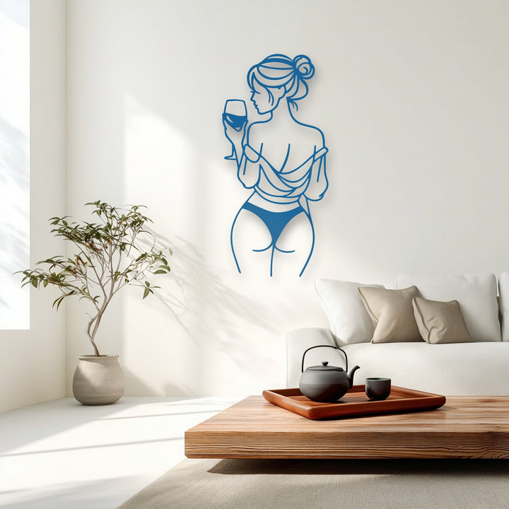 The serene and sophisticated mood of this elegant wine woman unique metal wall art evokes a calm and alluring ambiance.
