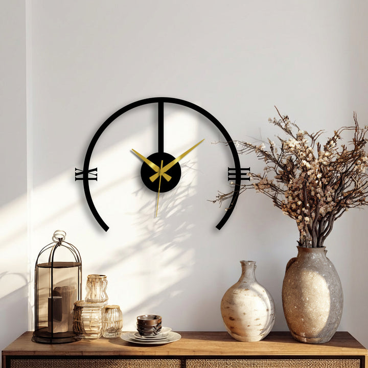 Warm lighting enhances the minimalist contemporary arch metal wall clock, showcasing a decorative metal art piece against a bright, neutral backdrop.
