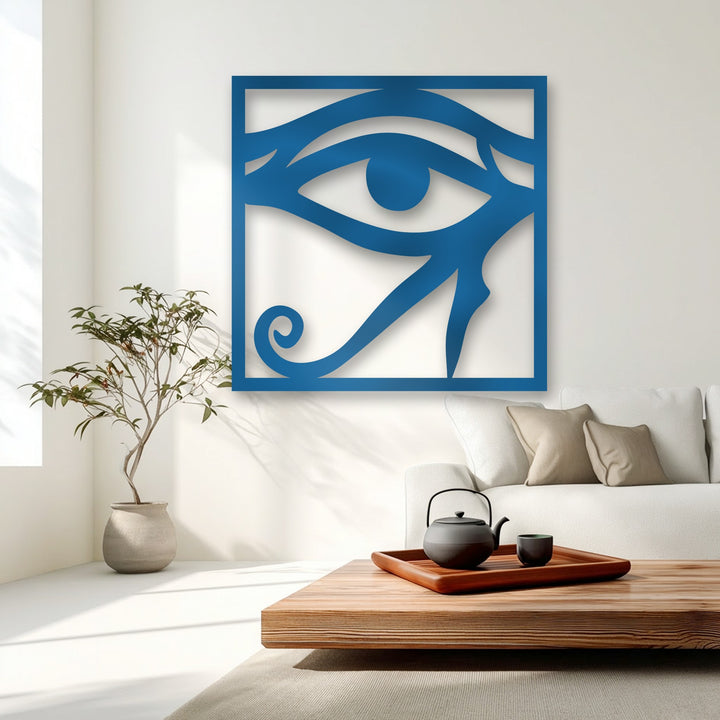 The smooth, matte finish of the deep blue Eye of Horus metal artwork creates a striking ancient Egyptian symbol decor.