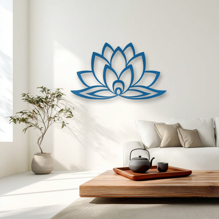 A striking azure minimalist lotus bloom metal artwork is displayed prominently on a bright white wall.