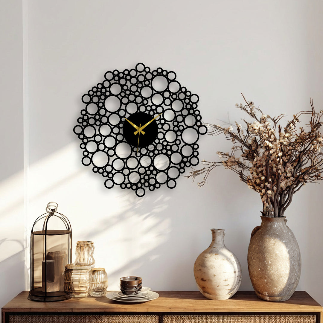 This bubble mesh metal wall clock, the central subject, showcases its unique metal wall art design through intricate circles, becoming a modern geometric focal point.