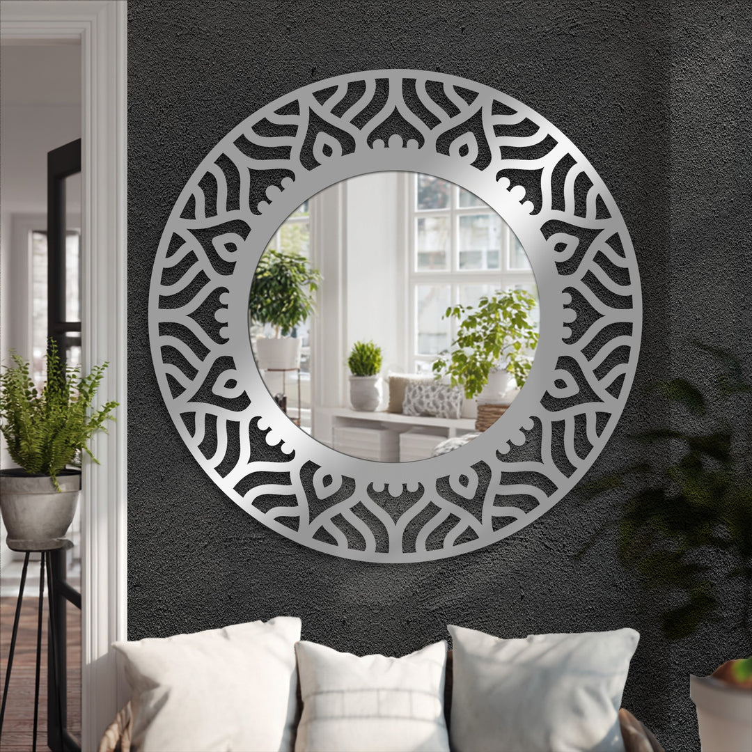Abstract patterned black metal frame makes this modern wall mirrors a focal point, reflecting light and style in any contemporary space.