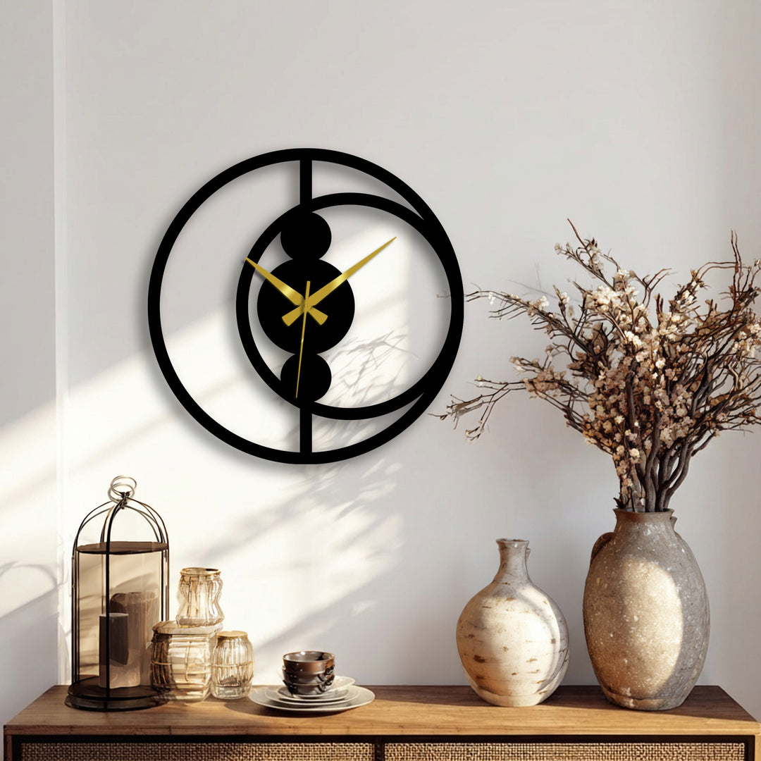 As the darkest area, the modern minimalist decorative clock's black metal art for wall creates a striking abstract design against the neutral wall.