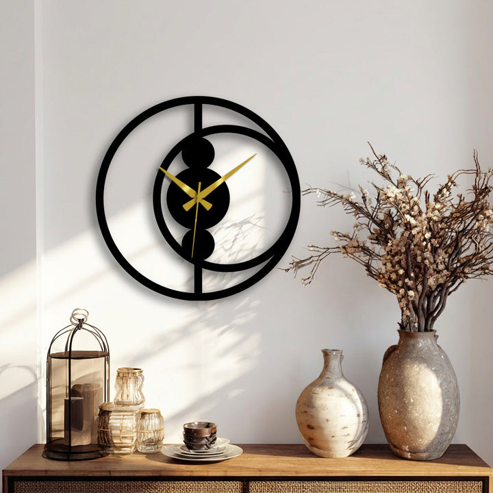 As the darkest area, the modern minimalist decorative clock's black metal art for wall creates a striking abstract design against the neutral wall.