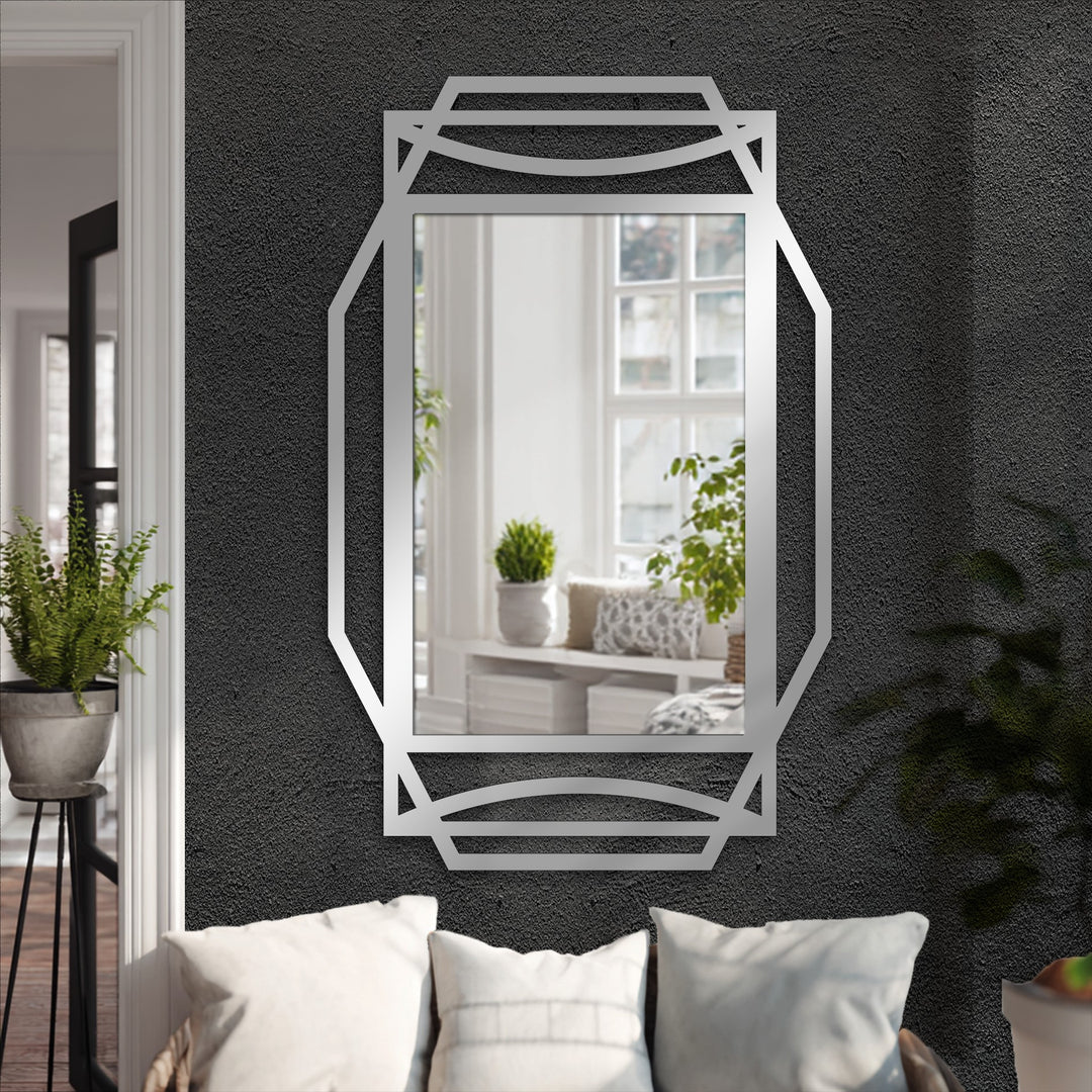 Stillness is captured in the reflection of this art deco accent rectangular floor decorative mirror, showcasing a simple framed geometric design.