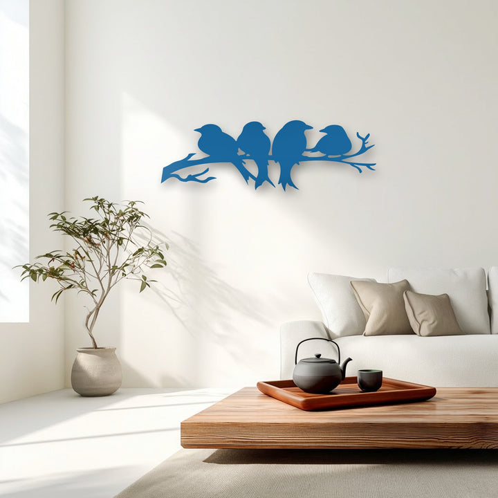 The sleek, vibrant blue matte finish of this unique metal wall art depicts minimalist birds on a branch, enhancing modern decor.