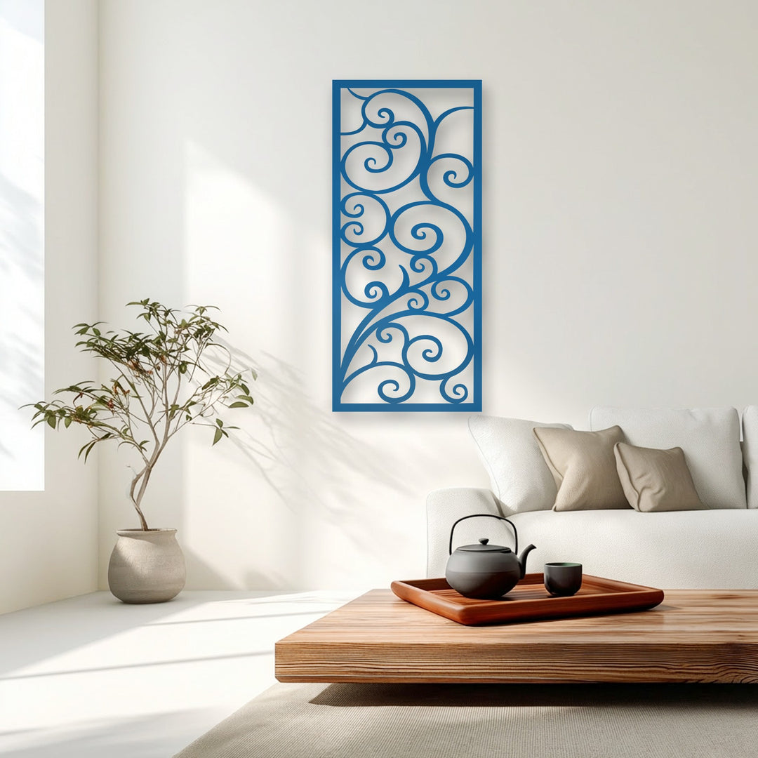 The dimensional layering of the intricate scroll pattern on this azure unique metal wall art creates captivating depth against the crisp white wall.