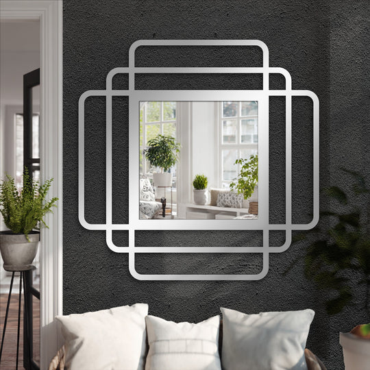 Stillness in the layered frames of the square, modern framed wall mirror, a decoration wall art piece reflecting a tranquil indoor scene.