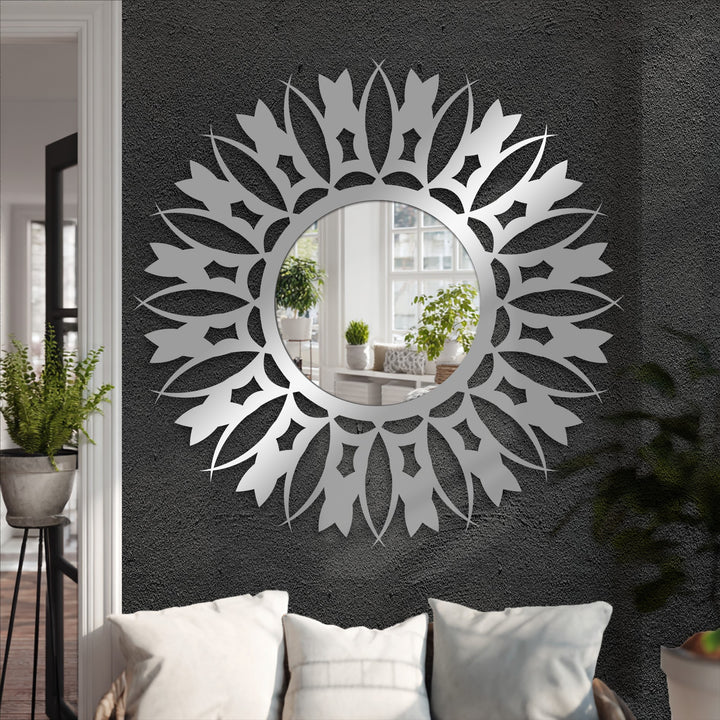 Textured wall accentuates the intricate surface of this decorative floral sunburst floor mirror, offering dimension and depth while decorating with wall mirrors.