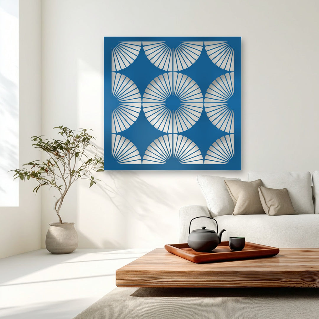 Square azure blue metal art for wall featuring a symmetrical geometric radiant fan pattern and distinct circular forms.