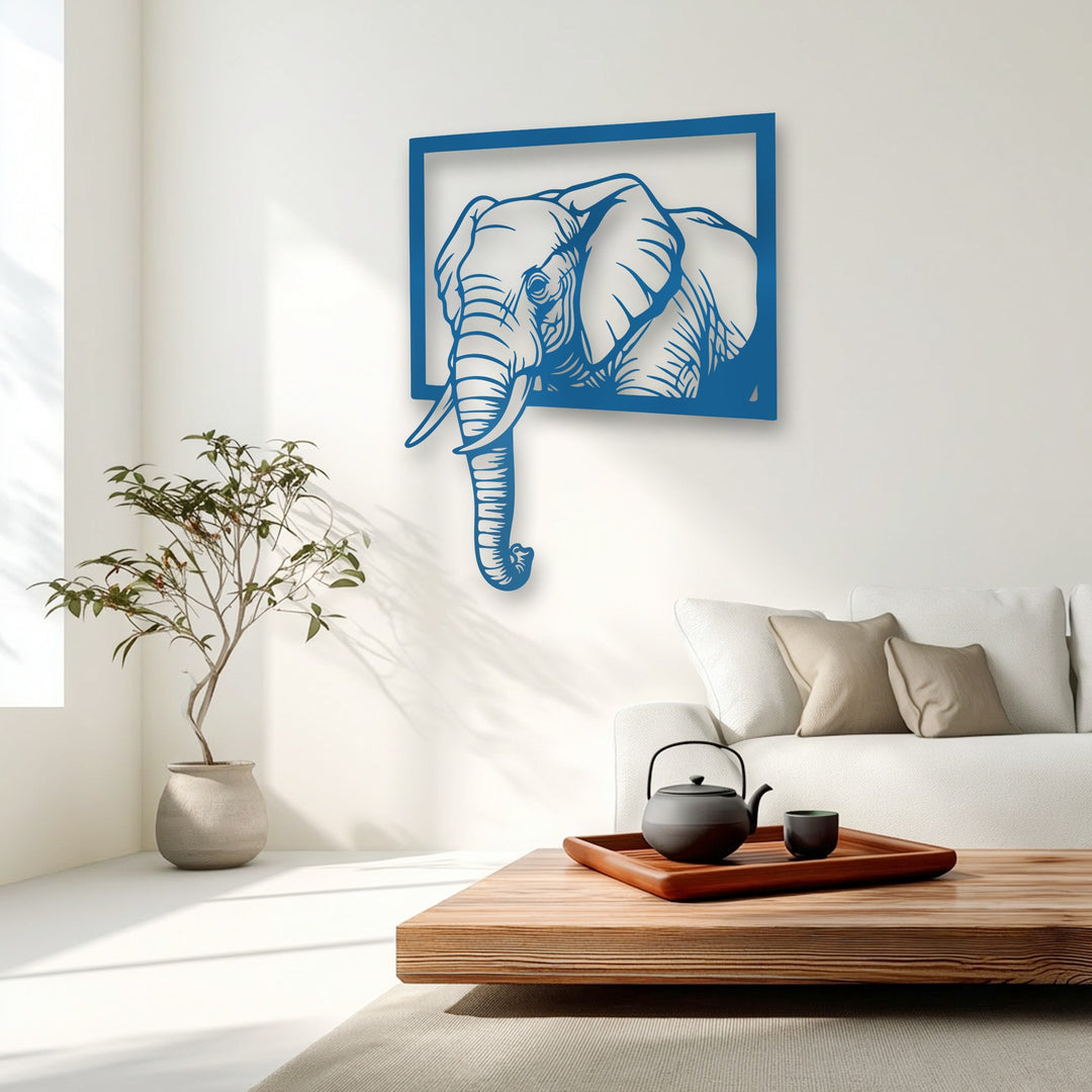 The bold blue elephant metal art for wall creates a distinct color transition against the bright white wall, enhancing its modern statement.