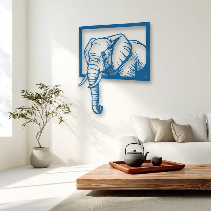 The bold blue elephant metal art for wall creates a distinct color transition against the bright white wall, enhancing its modern statement.