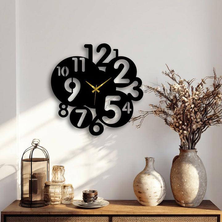 The distinct color transition of this black metal wall clock, with white numbers and gold hands, makes captivating decoration wall art.