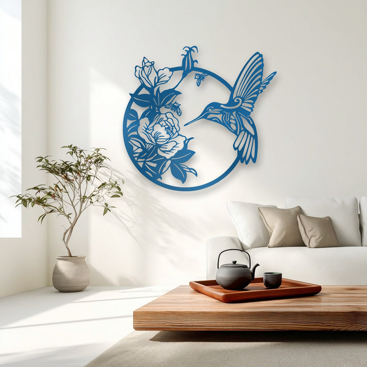 A rich wooden coffee table displays a dark teapot and cup on a red tray, resting on a soft rug before elegant metal wall decor.