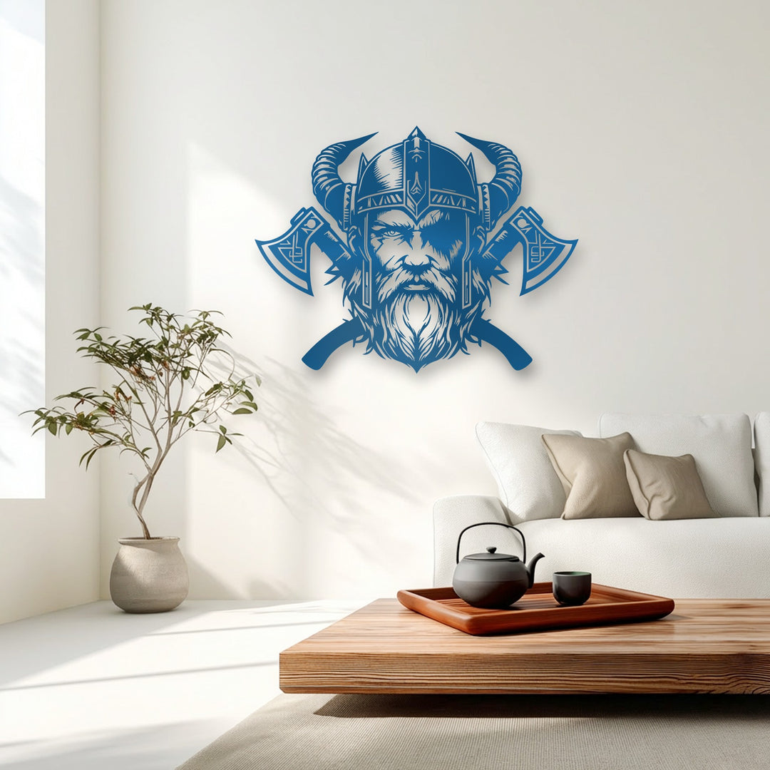 Negative space highlights the fierce blue Viking warrior's horned helmet and axes, creating a striking metal artwork on the clean wall.
