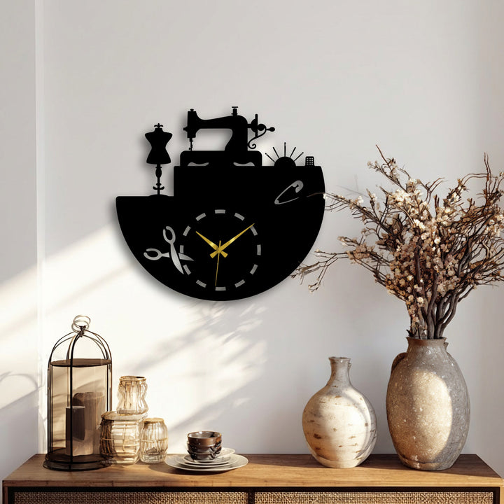 The matte black finish of the Sewing Atelier Metal Wall Clock beautifully showcases its tailor studio inspired decorative metal art design.