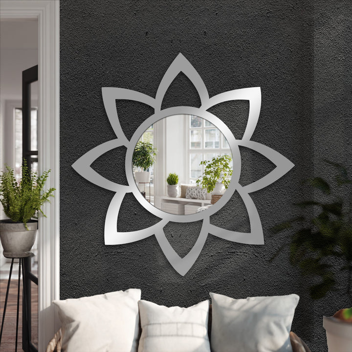 Showcasing the organic forms, a petal-shaped mirror offers creative decorating with wall mirrors, reflecting both light and floral-inspired design.