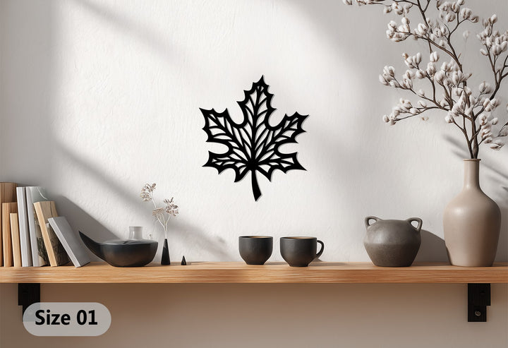 Highlighting the darkest area, this maple leaf metal art for wall creates a striking focal point with its intricate design and modern, nature-inspired form.