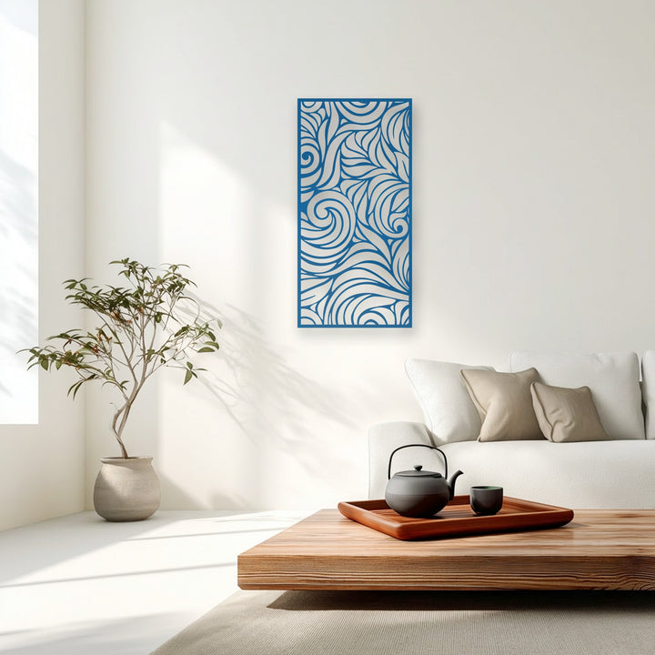 Striking color contrast between the vibrant blue abstract swirl metal artwork and the soft, neutral room decor highlights its modern design.