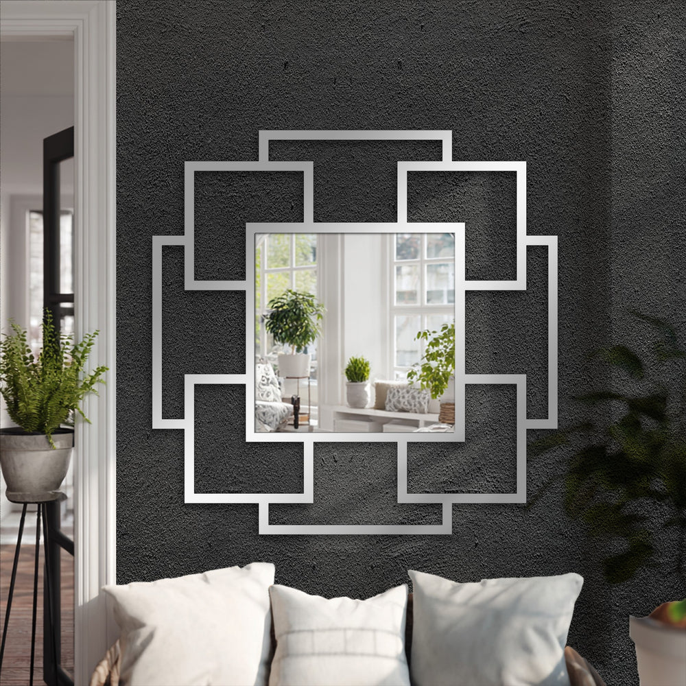 Realistic detail highlights the cascade squares layered geometric wall mirror featuring a precisely framed wall mirror within a modern square metal overlay.