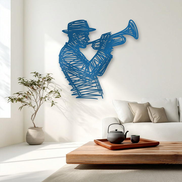 A light wooden coffee table with a dark teapot and cup on a tray complements the room's decoration wall art.