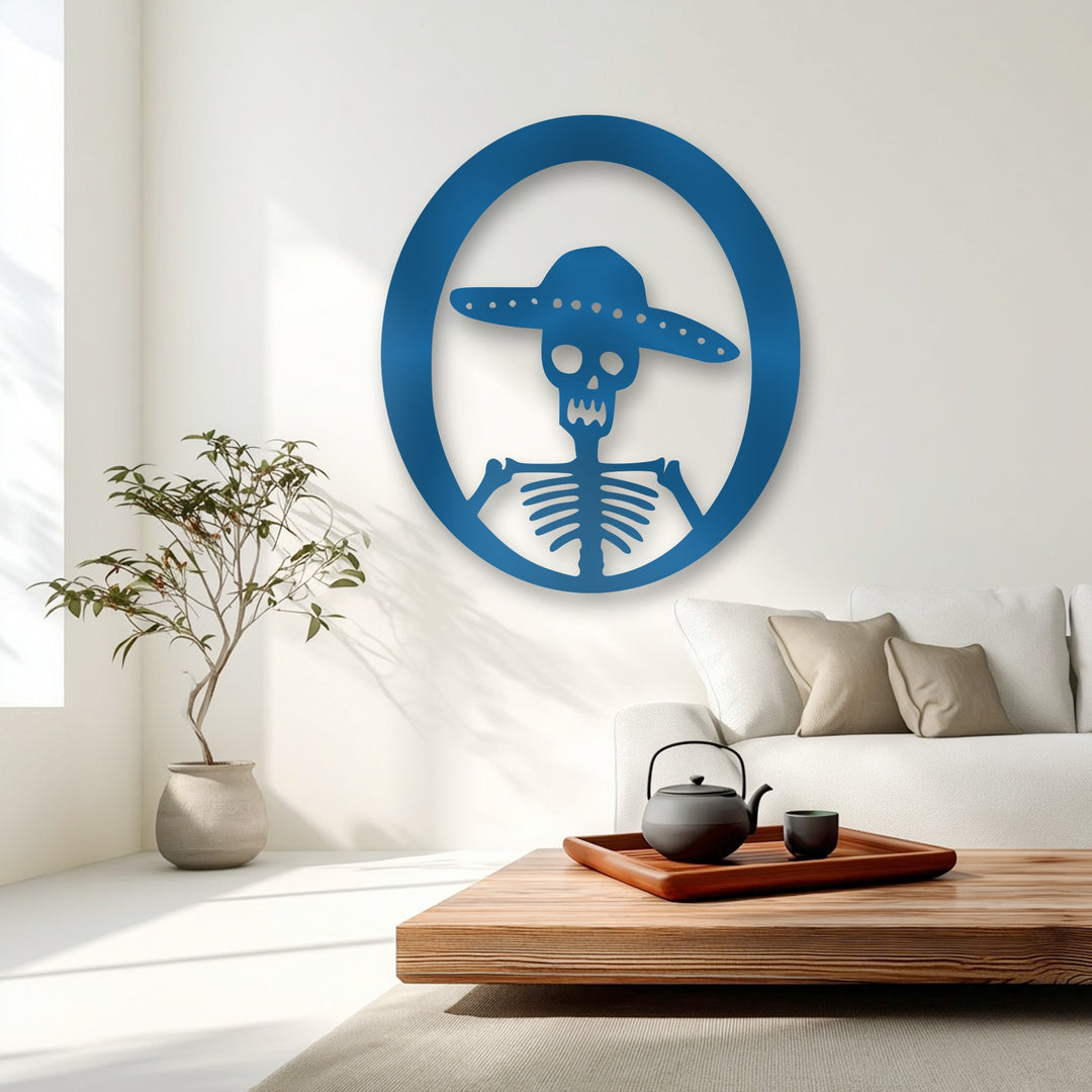 The visual rhythm of the vibrant blue Sombrero Skeleton decorative metal art creates a striking circular pattern on the clean white wall.