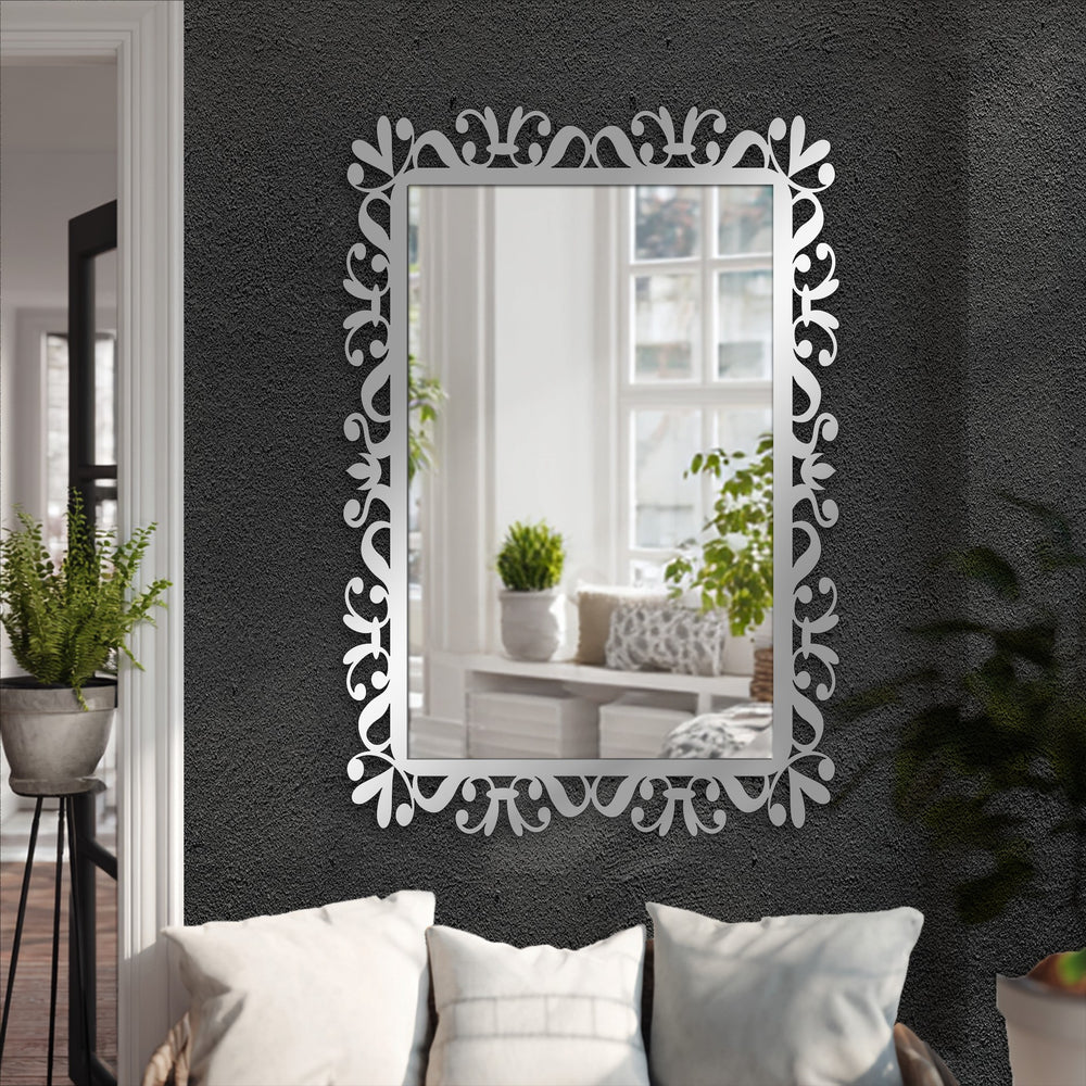 Decorating with wall mirrors, the delicate vine scroll floor mirror reflects a bright room and offers a decorative charm through its frame and design.