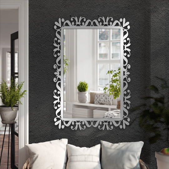 Decorating with wall mirrors, the delicate vine scroll floor mirror reflects a bright room and offers a decorative charm through its frame and design.