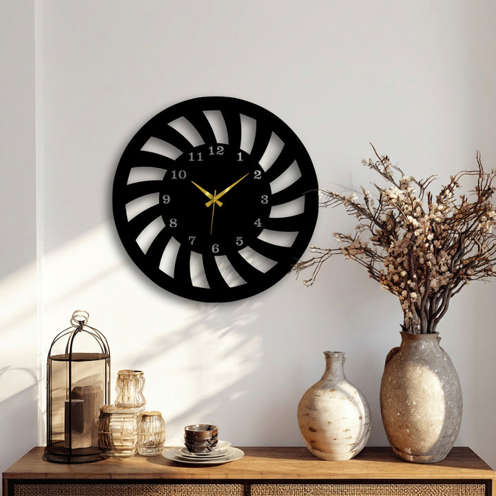 The abstract quality of the Spiral Motion Metal Wall Clock is highlighted by its dynamic design, a compelling piece of metal art for wall.