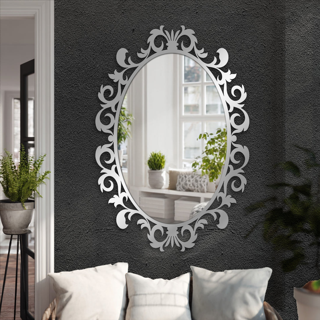 Gray accents define the reflective beauty of this Imperial Scroll Leaf Oval Floor Mirror, showcasing an elegant, stained glass wall mirror.