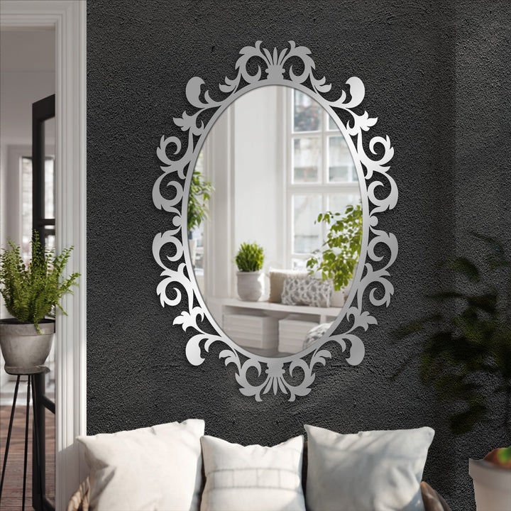 Gray accents define the reflective beauty of this Imperial Scroll Leaf Oval Floor Mirror, showcasing an elegant, stained glass wall mirror.