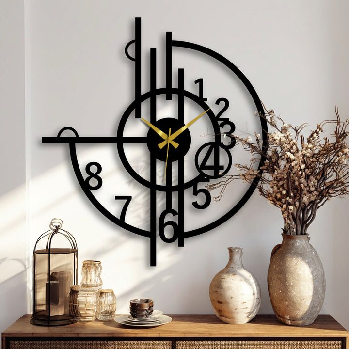 Highlighting the brightest area, a contemporary decorative metal art wall clock features abstract geometric numbers and striking gold hands.