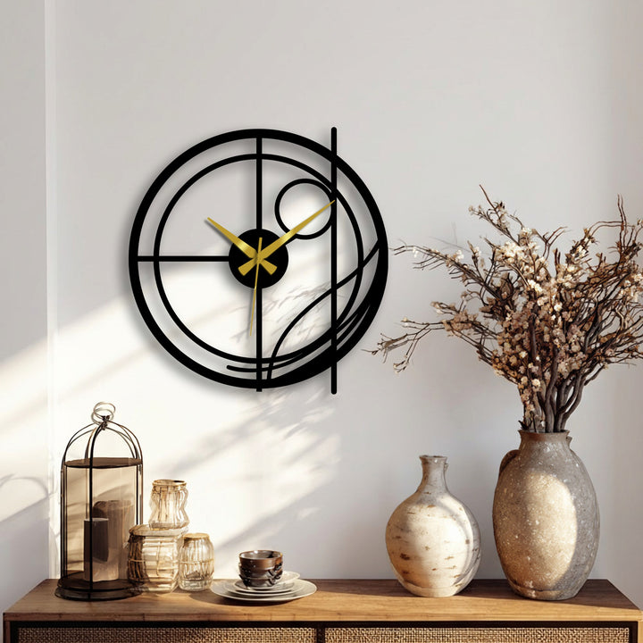 Organic lines create a striking metal decoration wall art clock, where geometric forms meet in a modern abstract circular design with gold hands.